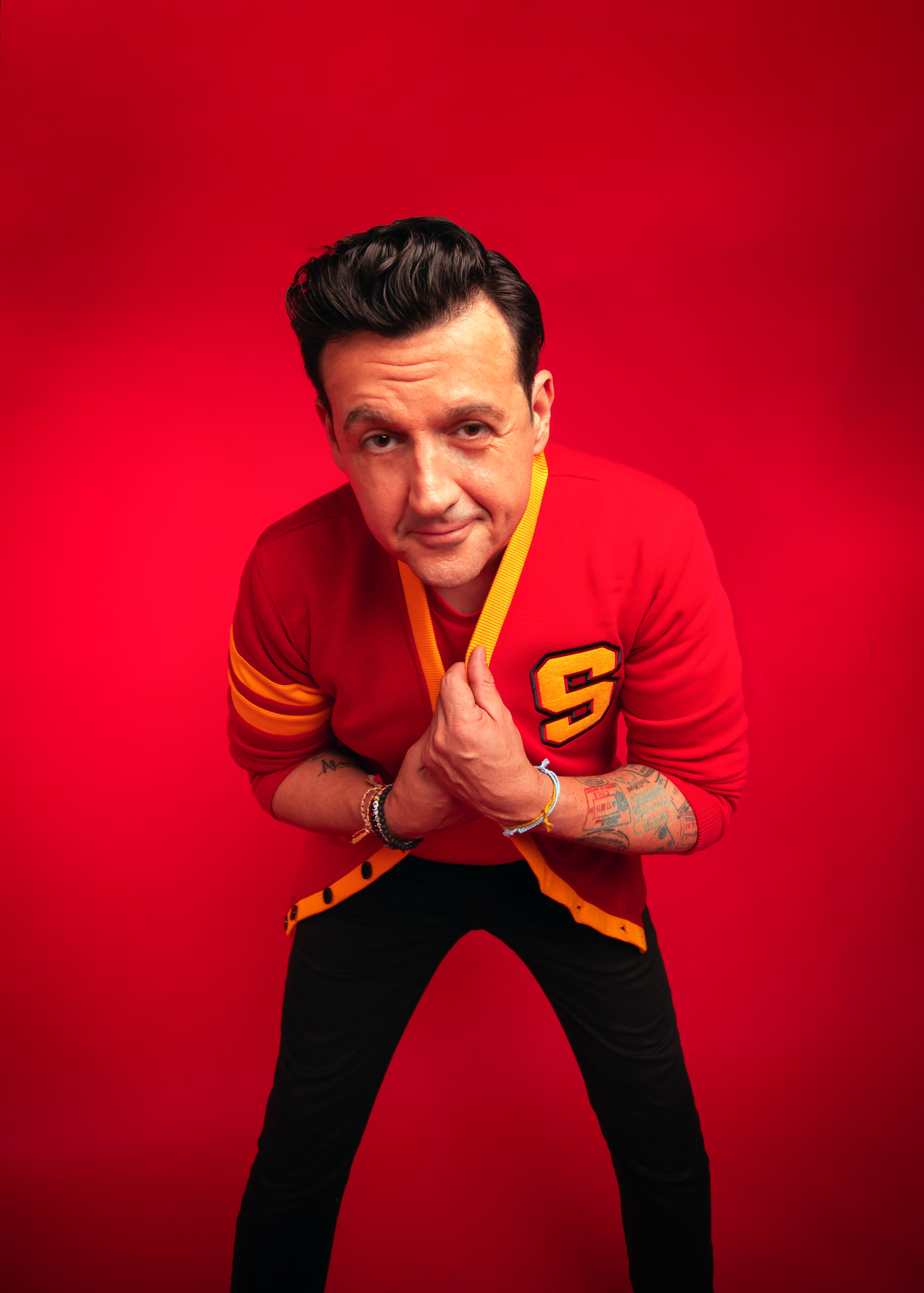 Sam Moran in his red varsity cardigan during the 2023 press shoot
