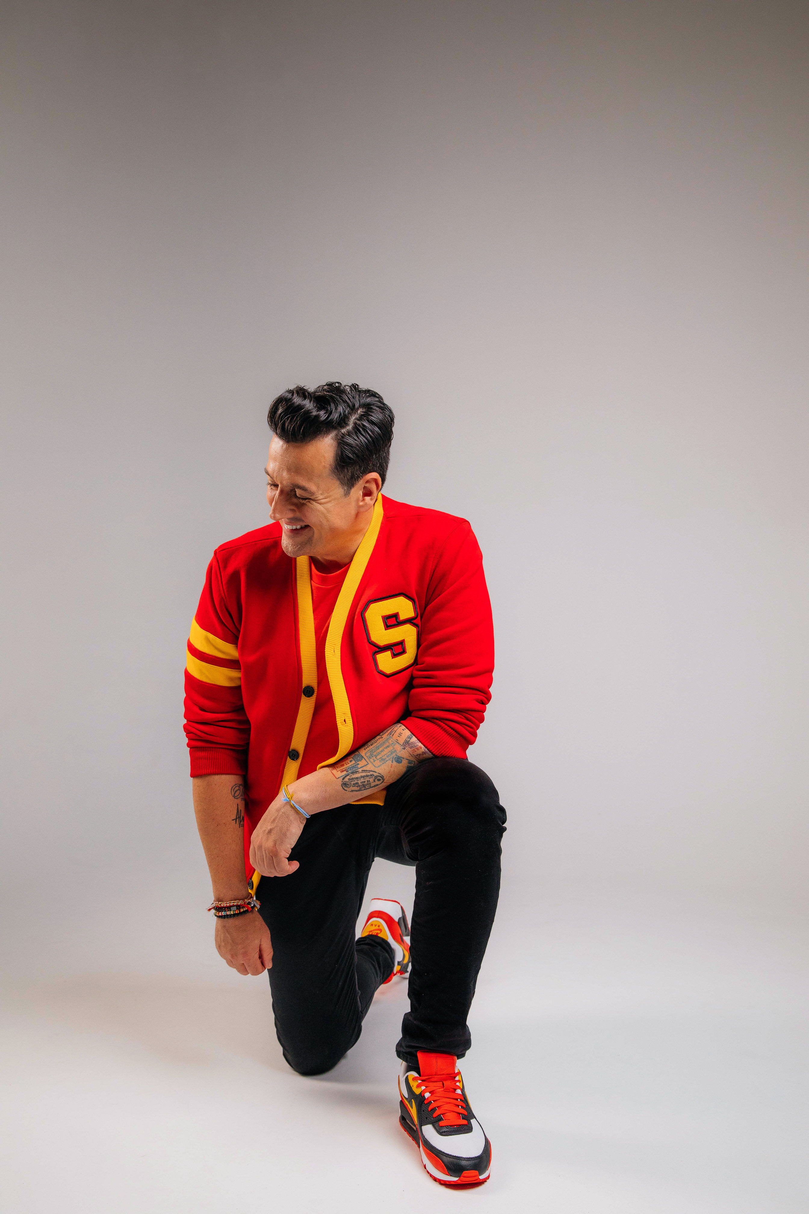 Sam Moran in his red varsity cardigan during the 2023 press shoot