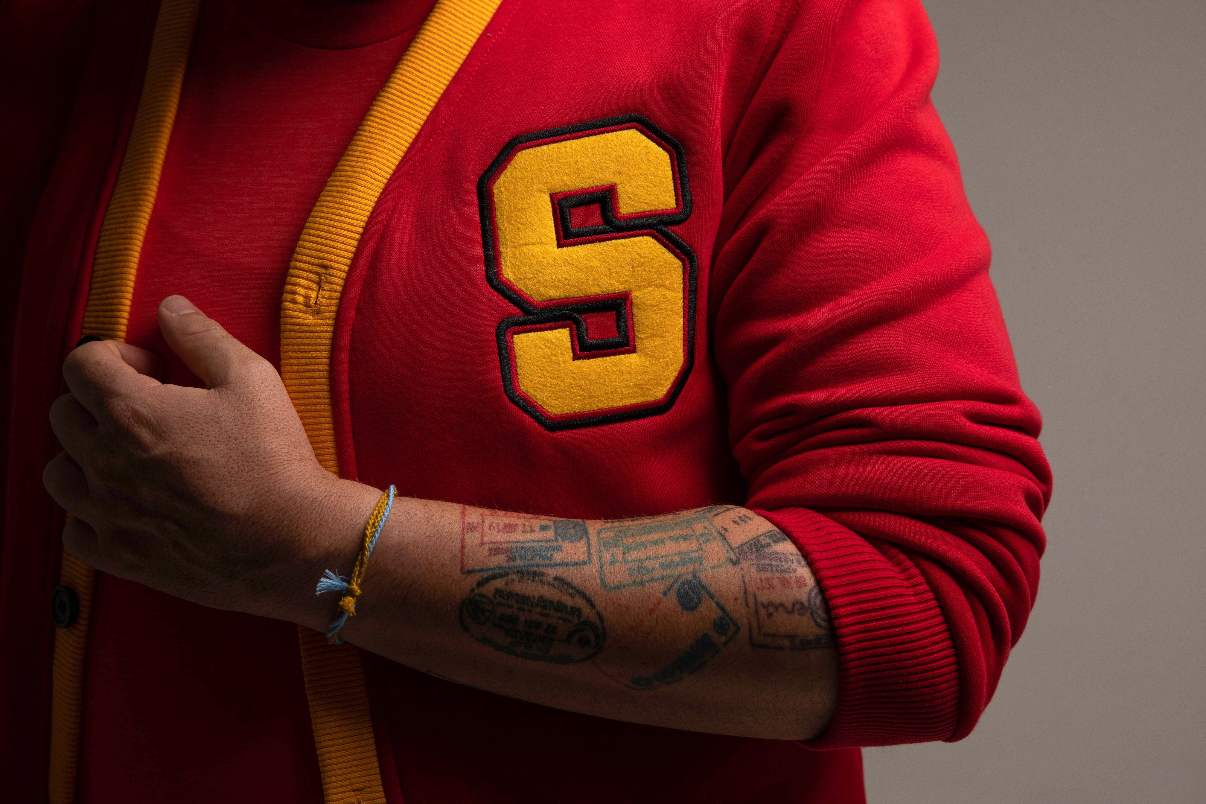 Sam Moran in his red varsity cardigan during the 2023 press shoot
