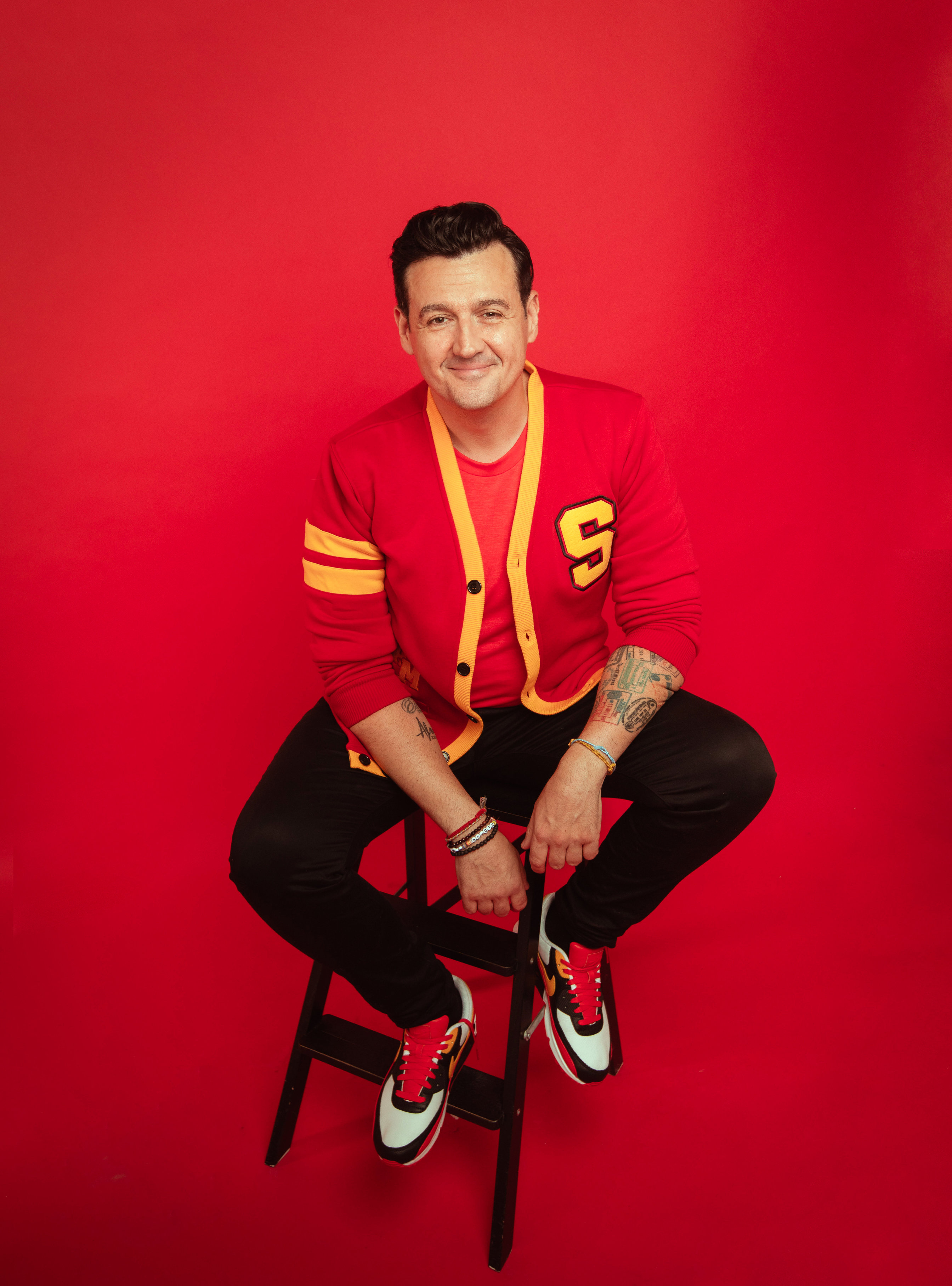 Sam Moran in his red varsity cardigan during the 2023 press shoot